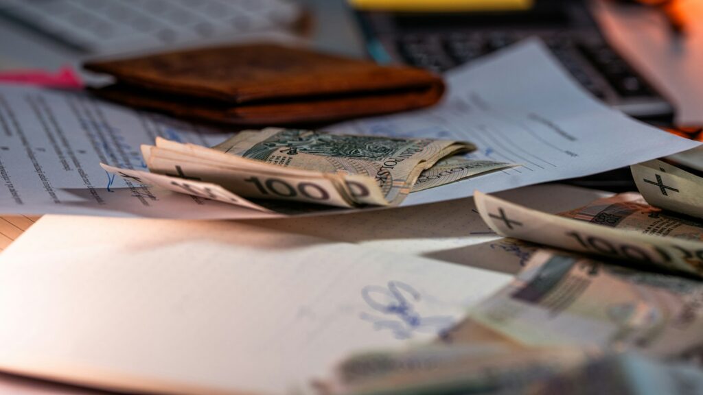 Money and documents on a desk