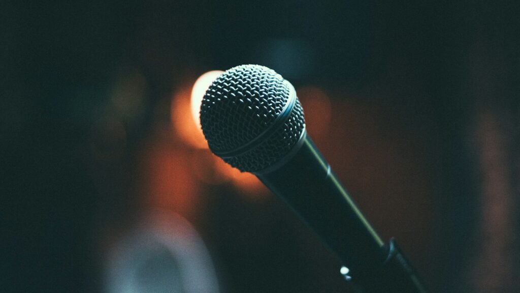 A microphone that is sitting on a stand