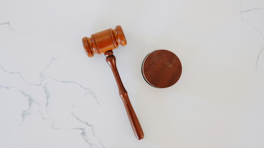 Wooden gavel and block on marble