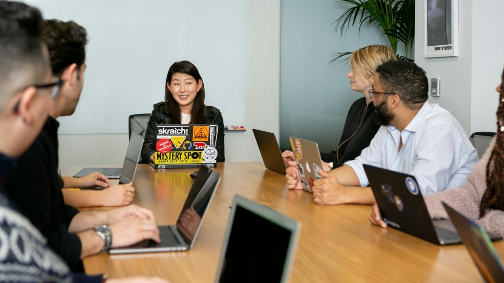 People in a meeting discussing app development