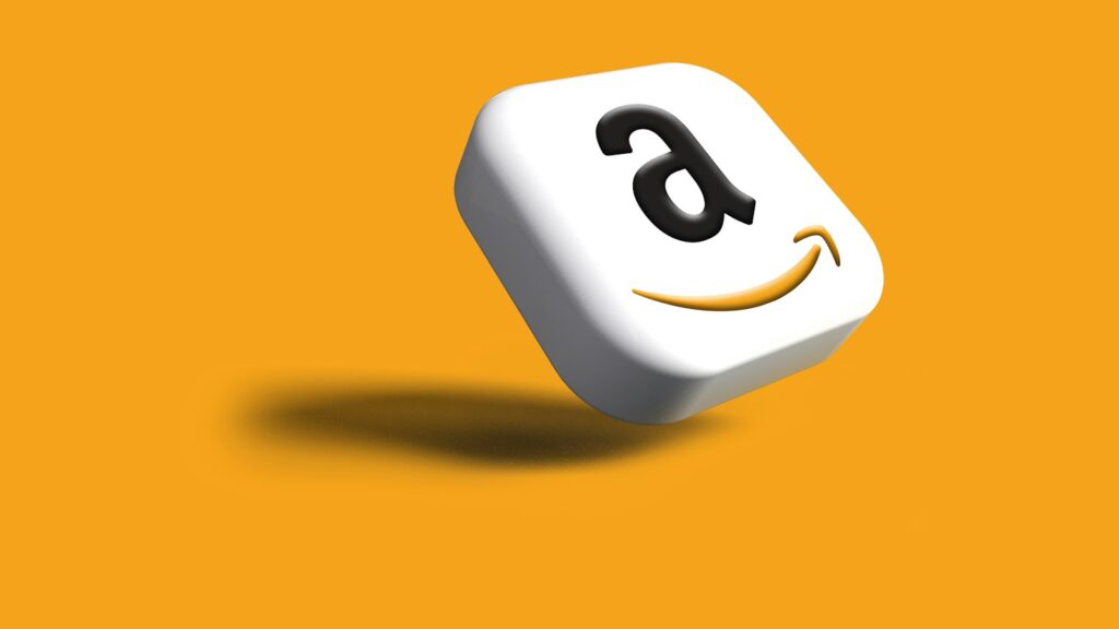A close up of a dice with an amazon logo on it