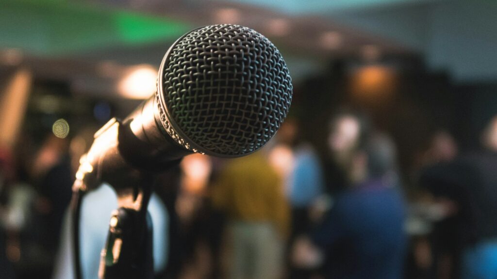 Silver corded microphone in shallow focus photography