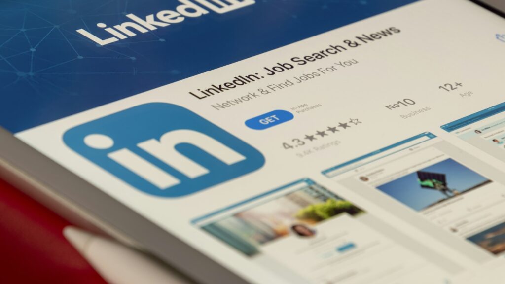 The LinkedIn app page displayed on a tablet screen with a blue background