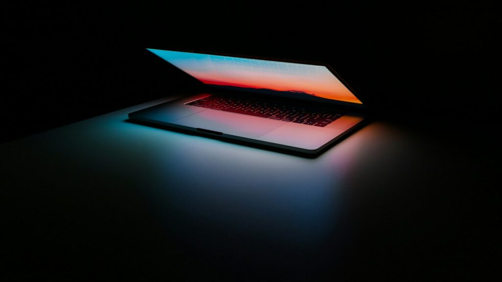 Gray and black laptop computer on surface